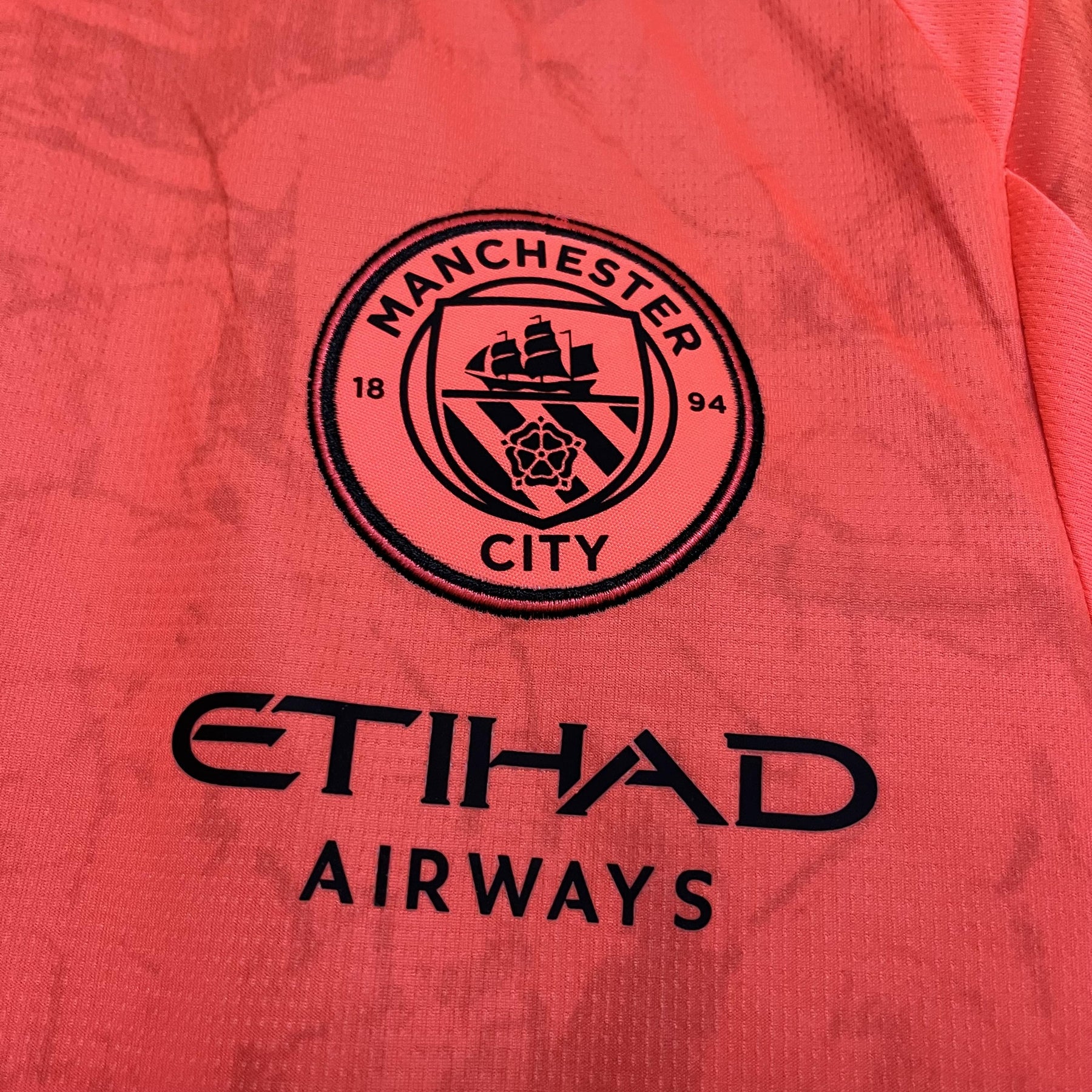 Camisa Manchester City III 25/26 - Laranja