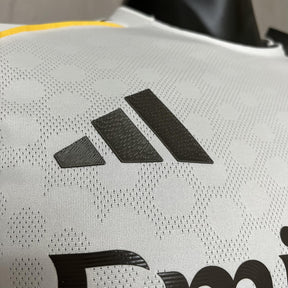 Camisa Real Madrid Titular 2025/26 - Versão Jogador Branco e Dourado